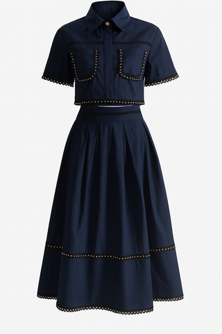 Eleganter Zweiteiler mit Häkel-Details und goldenen Akzenten